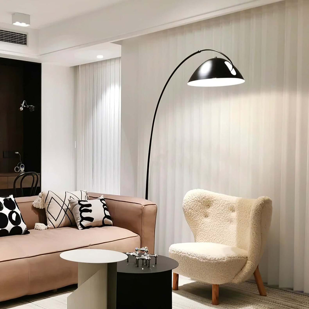 Justerbar bue gulvlampe i metal