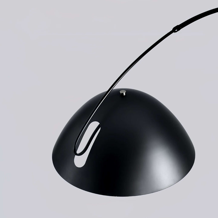 Justerbar bue gulvlampe i metal