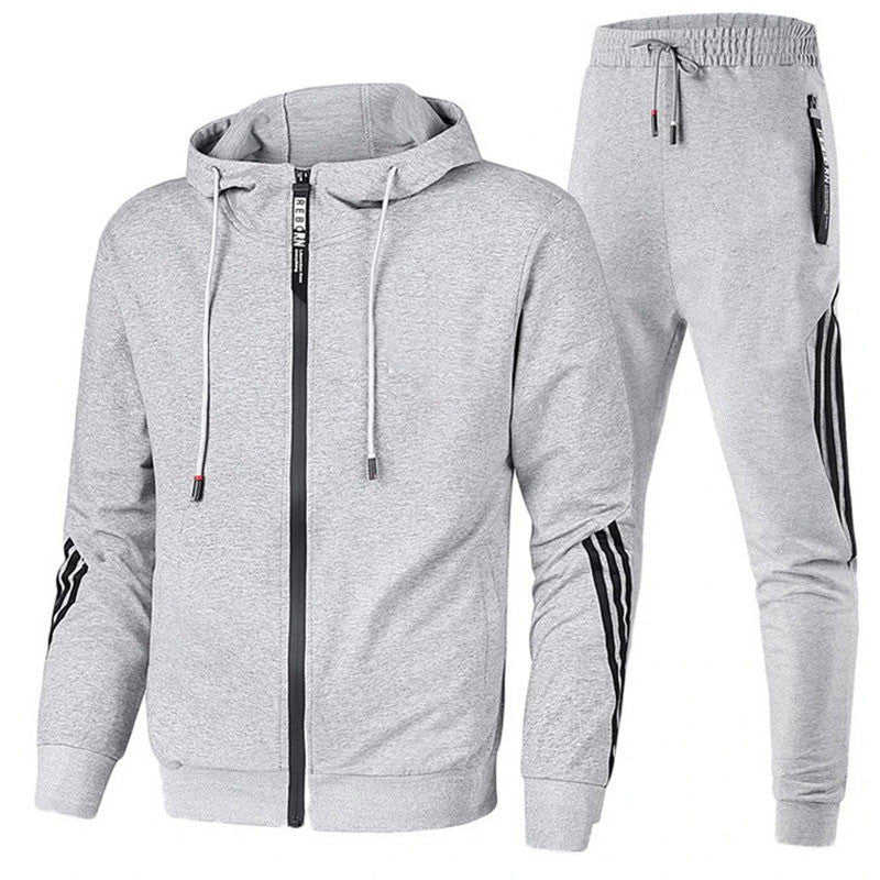 Alsidig træningsdragt i blødt, elastisk materiale med sporty look, ideel til både træning og afslapning i flere farver.
