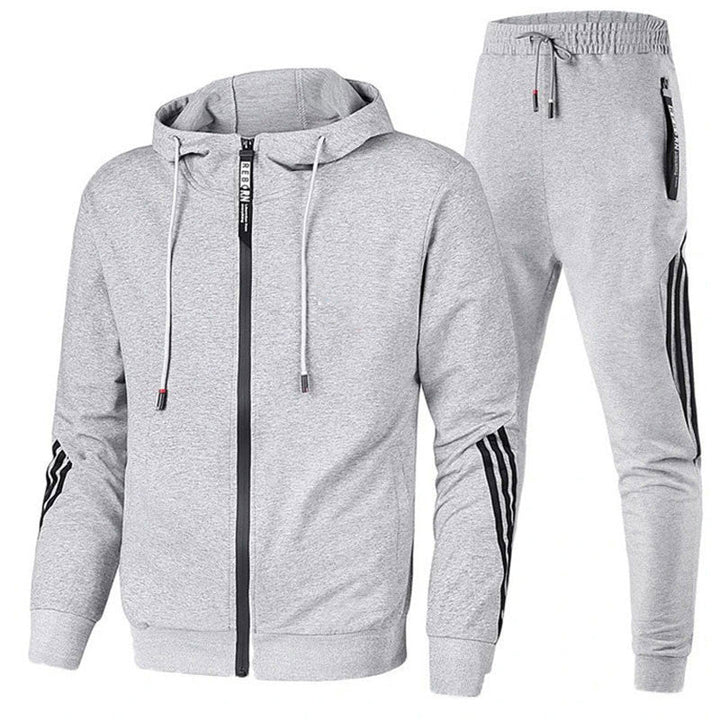 Alsidig træningsdragt i blødt, elastisk materiale med sporty look, ideel til både træning og afslapning i flere farver.