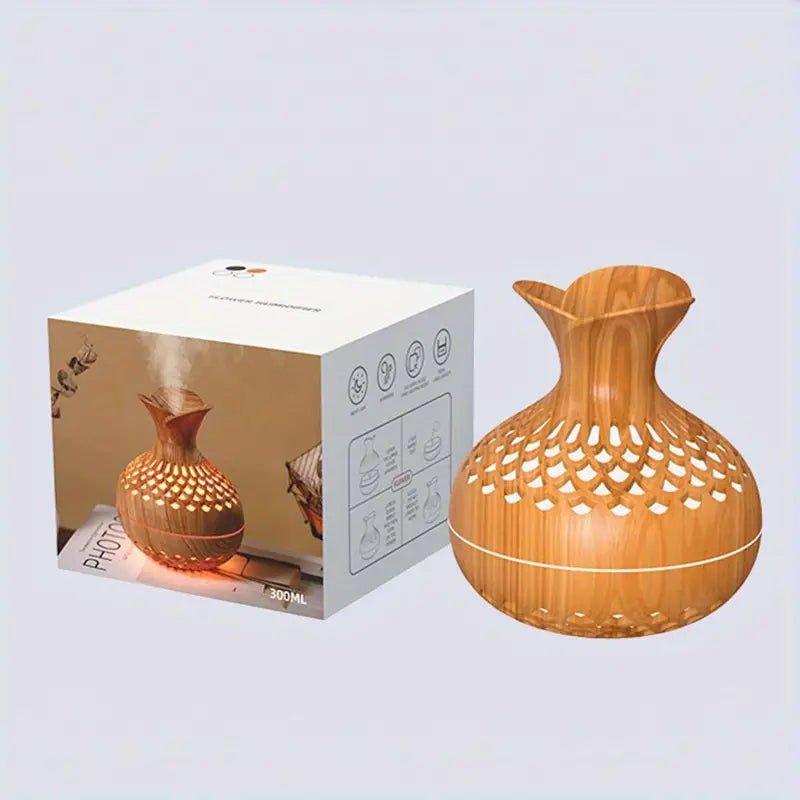 "Aroma diffuser med blomsterdesign, moderne look, tågeteknologi og USB-strøm. Skaber afslappende atmosfære i hjemmet."