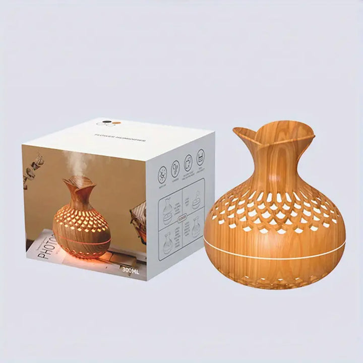 "Aroma diffuser med blomsterdesign, moderne look, tågeteknologi og USB-strøm. Skaber afslappende atmosfære i hjemmet."
