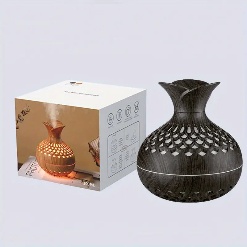 "Aroma diffuser med blomsterdesign, moderne look, tågeteknologi og USB-strøm. Skaber afslappende atmosfære i hjemmet."