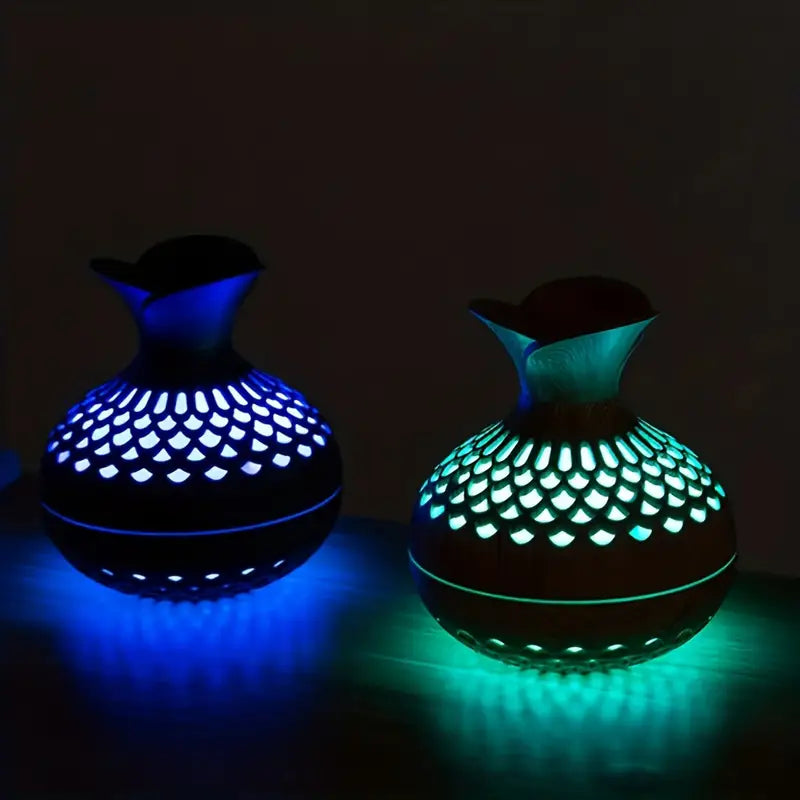 "Aroma diffuser med blomsterdesign, moderne look, tågeteknologi og USB-strøm. Skaber afslappende atmosfære i hjemmet."
