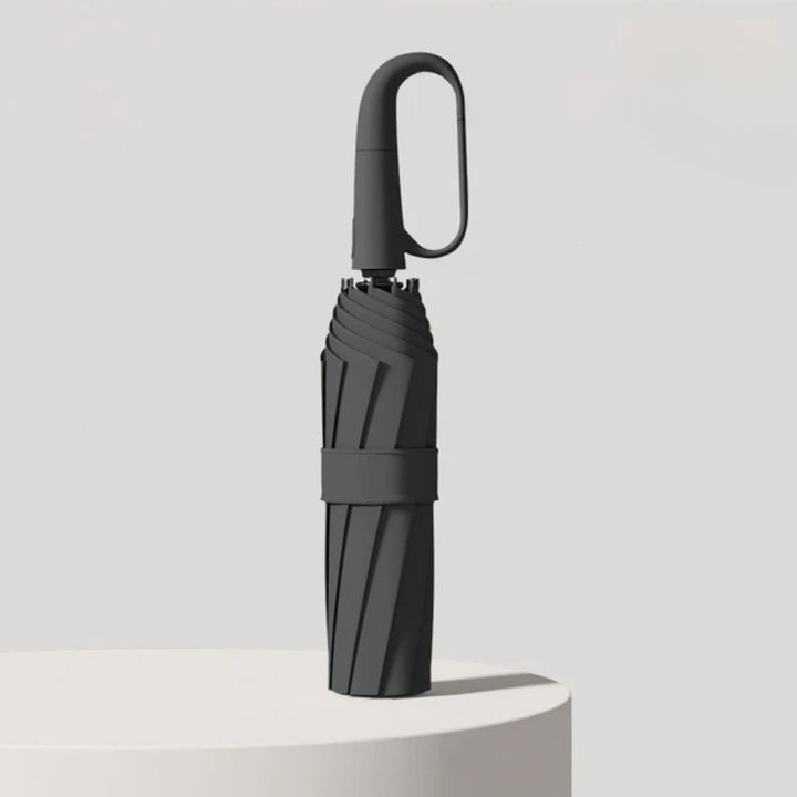 Automatisk vindtæt paraply med reflekterende kant, åben og klar til brug mod regnen med robust design og synlighed.