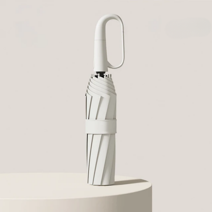Automatisk vindtæt paraply med reflekterende kant, åben og klar til brug mod regnen med robust design og synlighed.