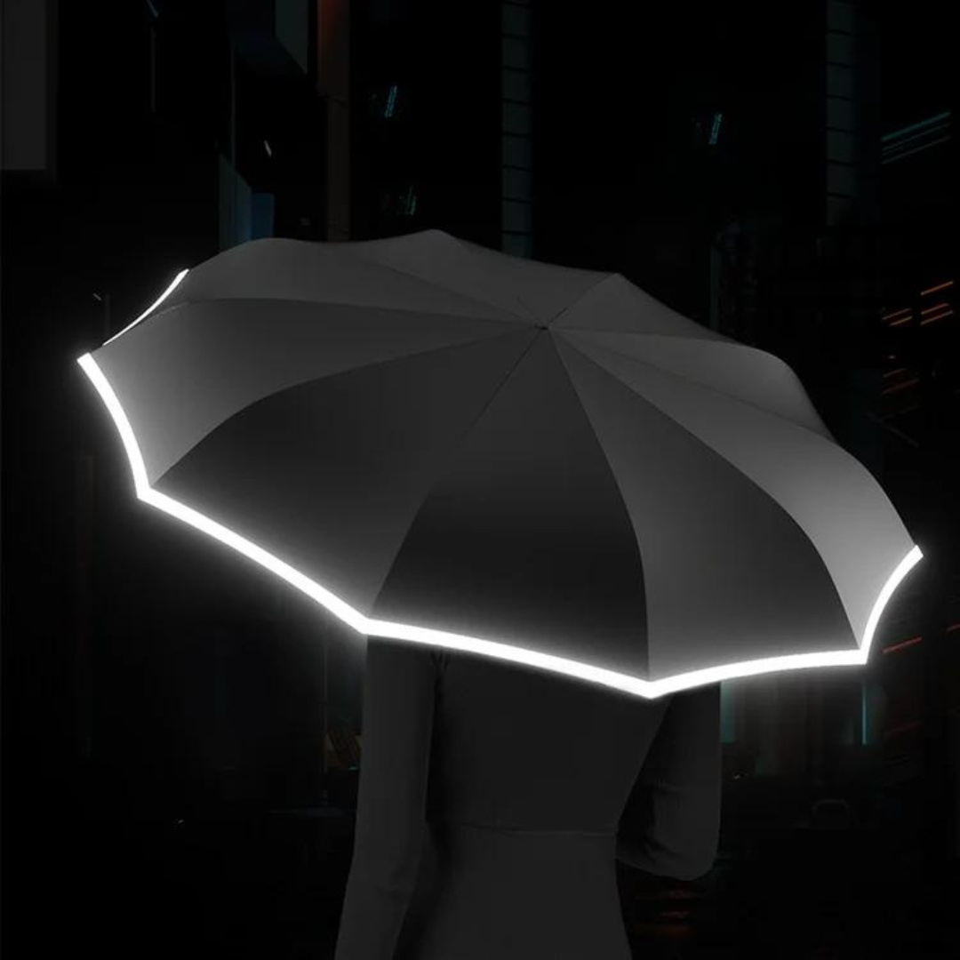 Automatisk vindtæt paraply med reflekterende kant, åben og klar til brug mod regnen med robust design og synlighed.