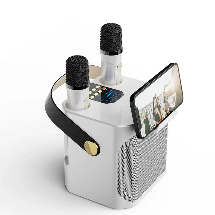 Bærbart karaoke system med to trådløse mikrofoner og fordybende 360° lyd til fest.