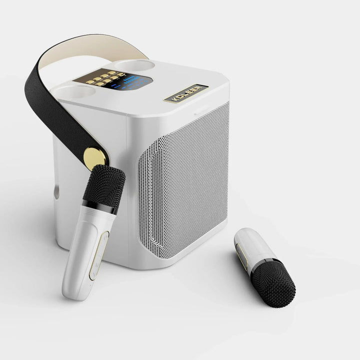 Kompakt bærbart karaoke anlæg med klar 360° lyd og dobbelt trådløse mikrofoner til musik.