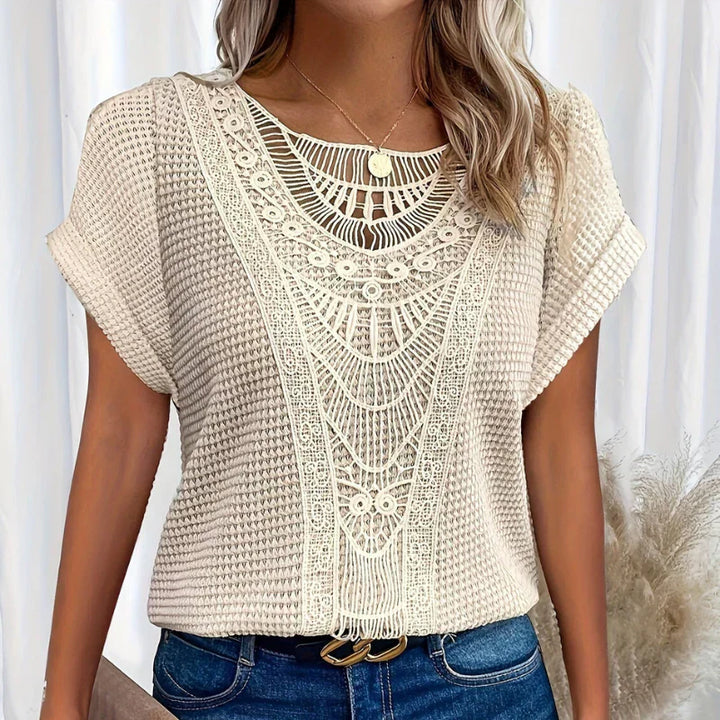 Blå dame top med løs pasform, åndbar og elegant. Komfortabel sommer top, ideel til hverdag.