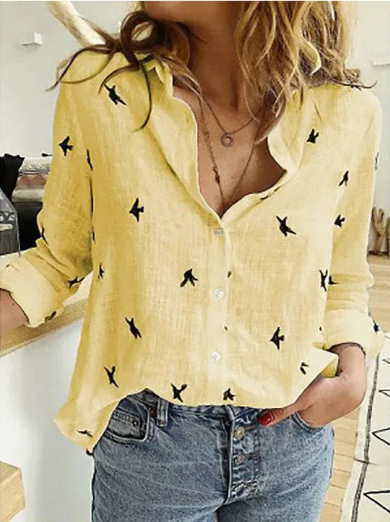 Alva blomstret bluse med vintage design, løs pasform og behagelig komfort, perfekt til både hverdag og fest.