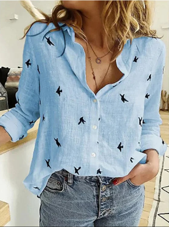 Alva blomstret bluse med vintage design, løs pasform og behagelig komfort, perfekt til både hverdag og fest.
