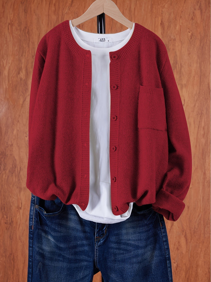 "Blød oversized uld strikcardigan til kvinder, elegant og komfortabel med afslappet pasform og praktiske lommer."