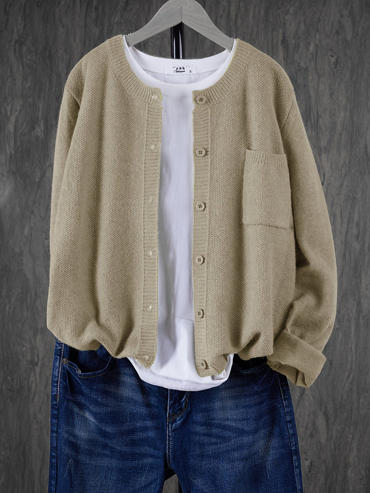 "Blød oversized uld strikcardigan til kvinder, elegant og komfortabel med afslappet pasform og praktiske lommer."