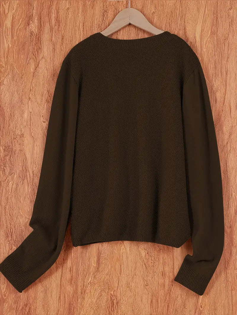 "Blød oversized uld strikcardigan til kvinder, elegant og komfortabel med afslappet pasform og praktiske lommer."