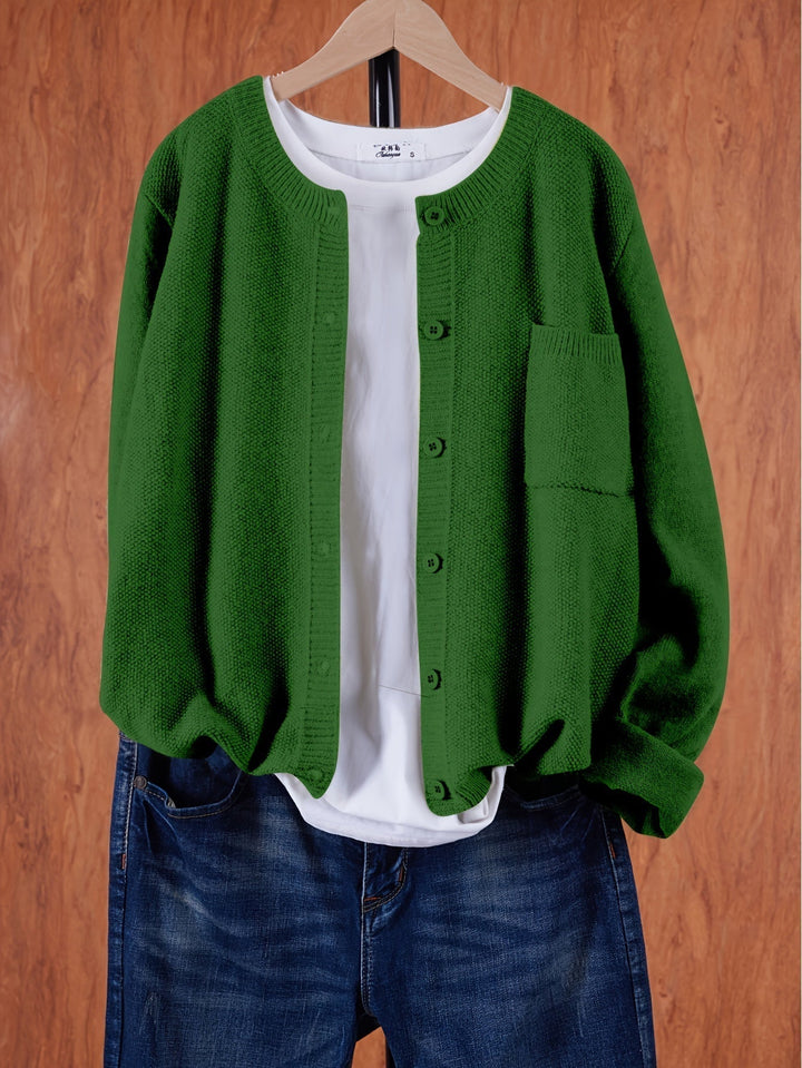 "Blød oversized uld strikcardigan til kvinder, elegant og komfortabel med afslappet pasform og praktiske lommer."