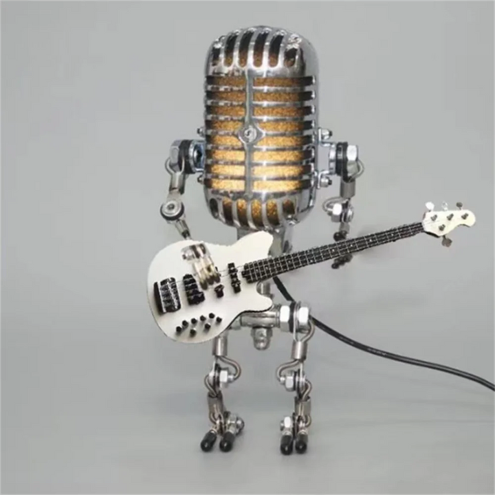 Unik robot bordlampe med musiktema til børneværelset eller moderne indretning. Skaber hyggelig stemning.