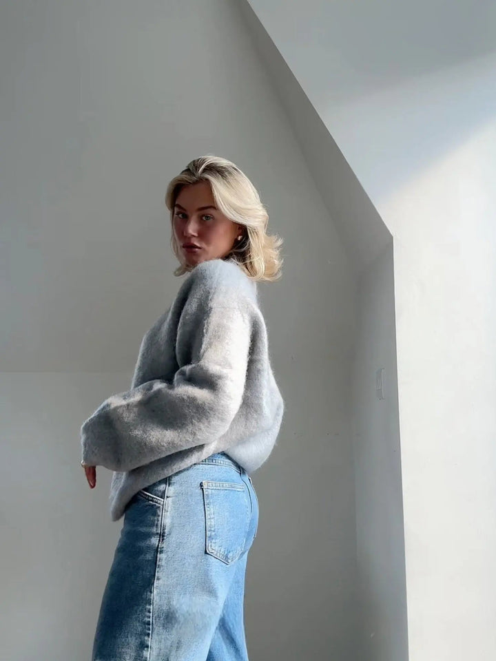 Alsidig dame strikpullover for ultimativ komfort. Blød, varm og stilfuld, essentiel vintermode.
