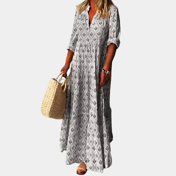"Dame maxi kjole blå med V-hals og 3/4 ærmer, let materiale, perfekt til sommer og forår, afslappet stil."