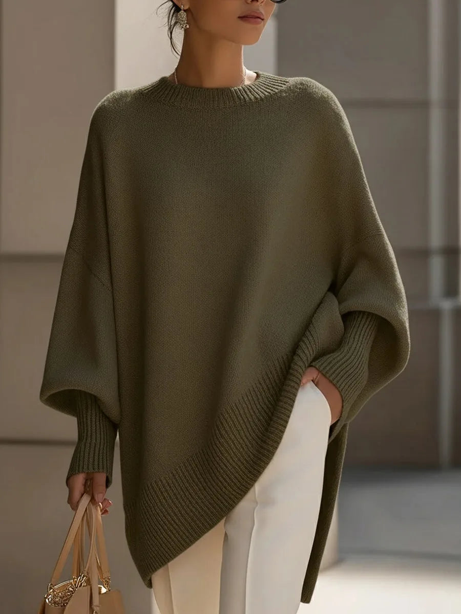 Blød og varm dame striktrøje i merinould. Oversized pasform, perfekt til efterår og vinter.
