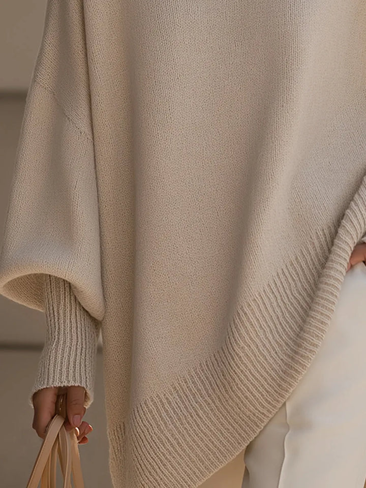 Komfortabel oversized merinould striktrøje til kvinder. Langærmet design og rund hals.