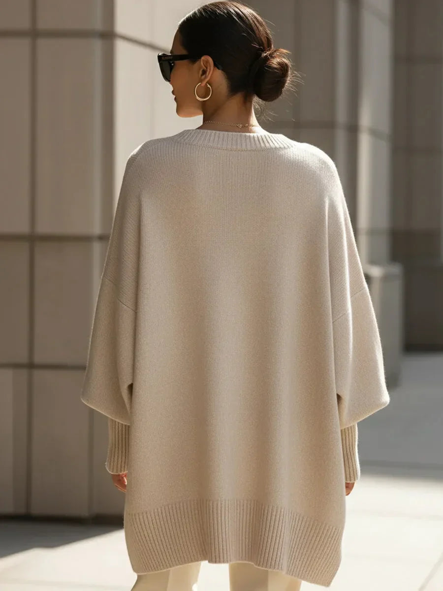 Stilfuld dame striktrøje i blød merinould. Oversized pasform, ideel til casual mode.
