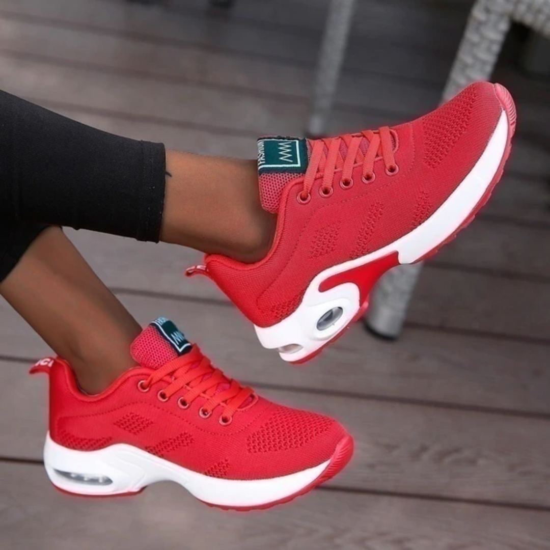 "Dameløbesko letvægts sneakers i hvid, lilla og pink med åndbart mesh og stødabsorbering, ideel til løb og gåture."