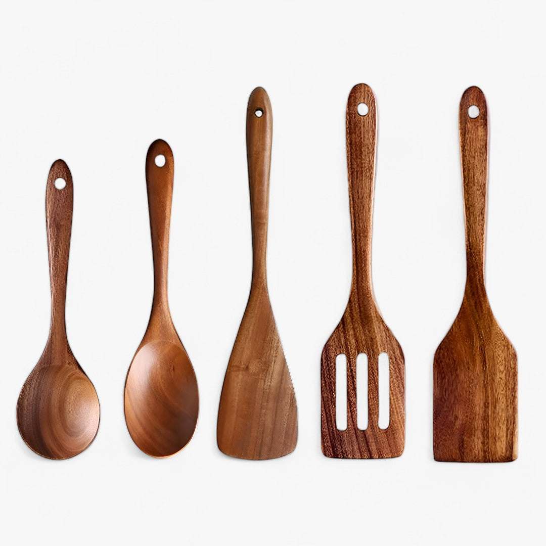 "Elegant 7-delt køkkenredskabssæt i moderne design med ergonomiske håndtag, perfekt til enhver køkkenindretning."