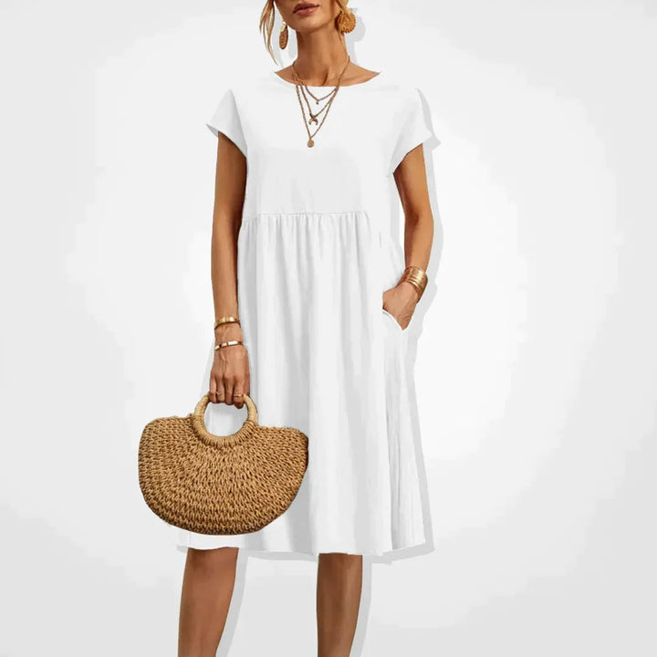 Elegant beige sommerkjole til kvinder, empirestil, velegnet til fest og hverdag.