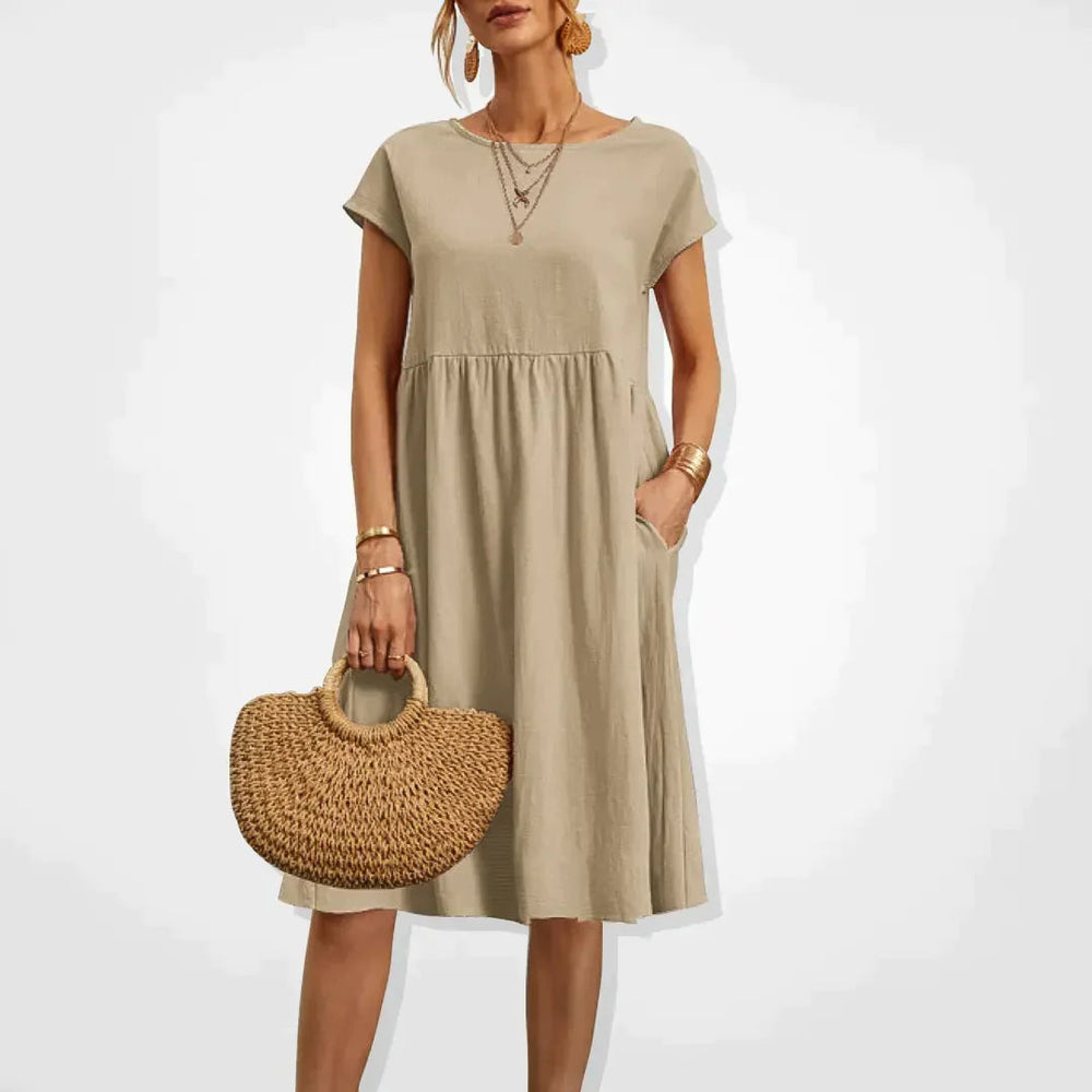 Elegant beige sommerkjole til kvinder, empirestil, velegnet til fest og hverdag.