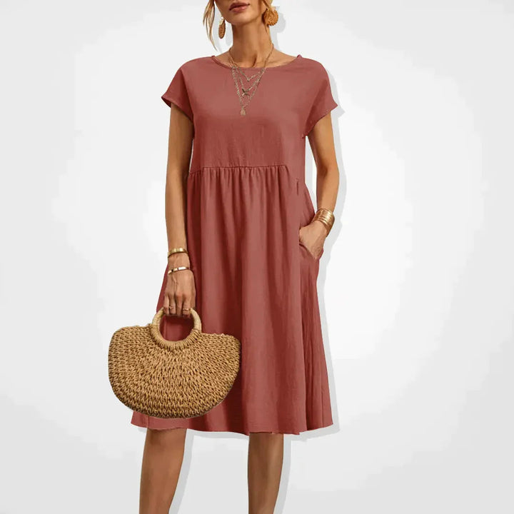 Elegant beige sommerkjole til kvinder, empirestil, velegnet til fest og hverdag.