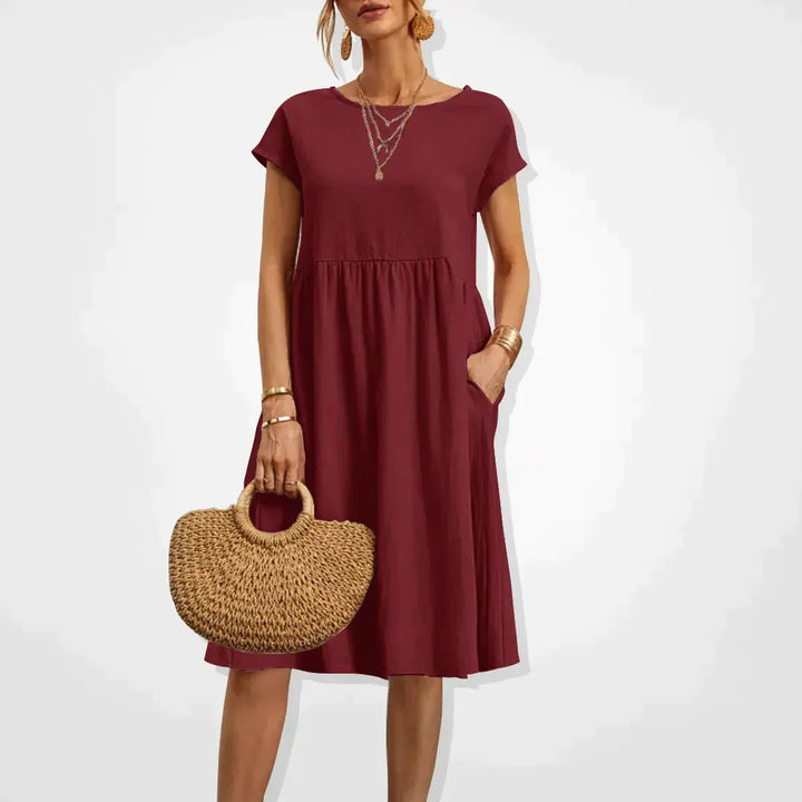 Elegant beige sommerkjole til kvinder, empirestil, velegnet til fest og hverdag.
