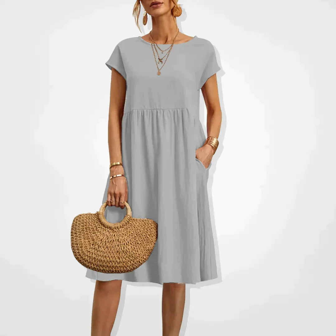 Elegant beige sommerkjole til kvinder, empirestil, velegnet til fest og hverdag.