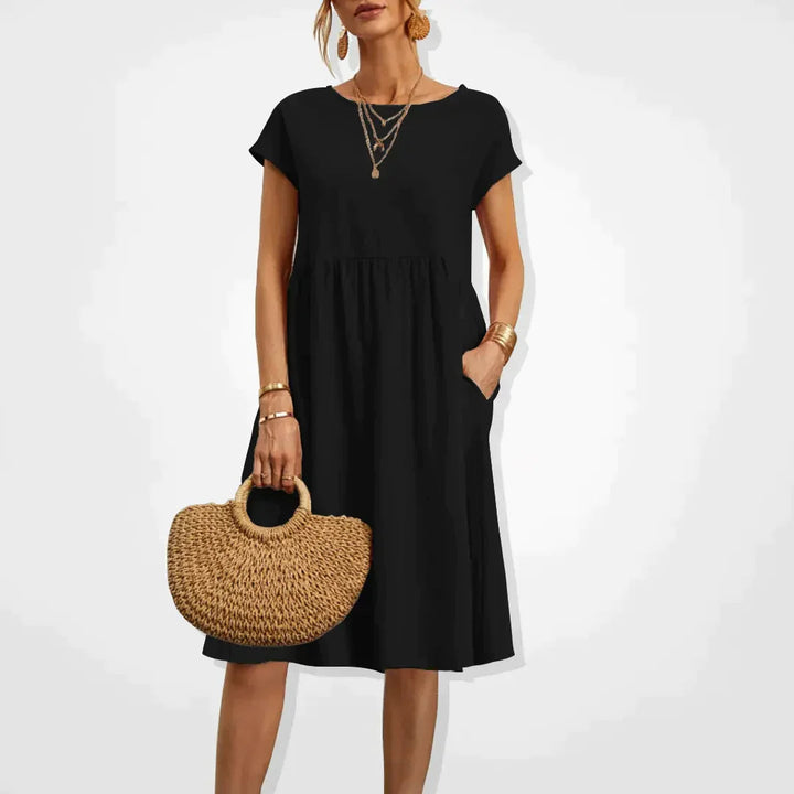 Elegant beige sommerkjole til kvinder, empirestil, velegnet til fest og hverdag.