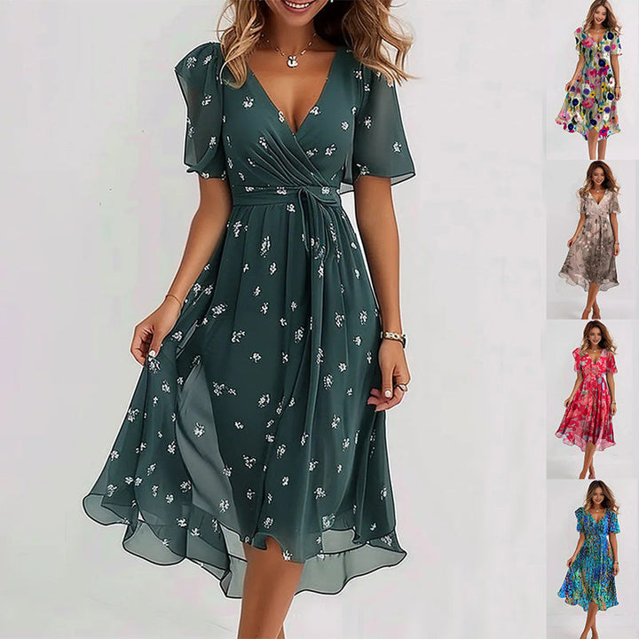 Elegant blomstret midi kjole til kvinder, yndefuld silhuet, tidløs stil til enhver anledning.