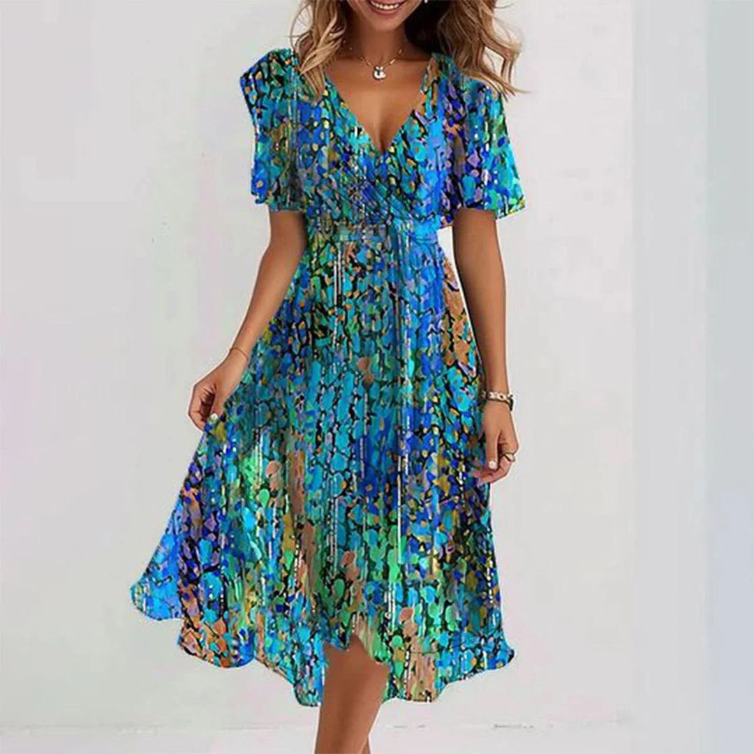 Elegant blomstret midi kjole til kvinder, yndefuld silhuet, tidløs stil til enhver anledning.