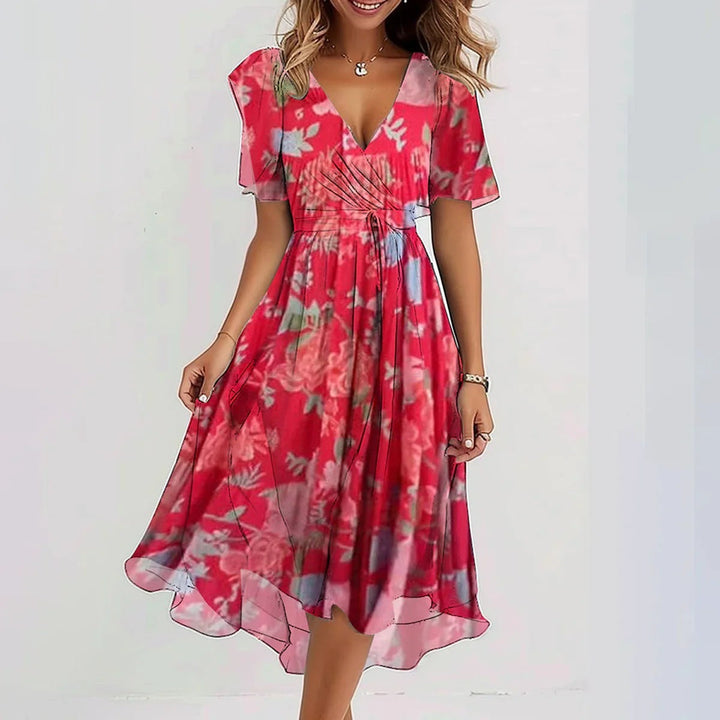 Elegant blomstret midi kjole til kvinder, yndefuld silhuet, tidløs stil til enhver anledning.