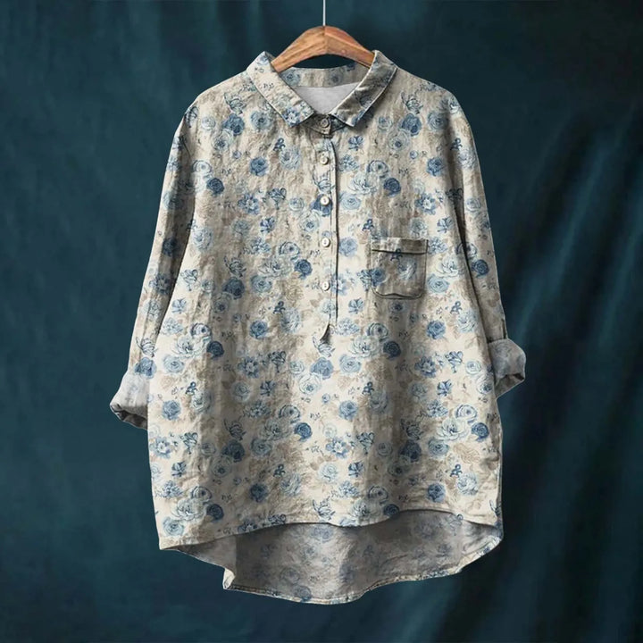 "Elegant blomsterskjorte med stribet design og bløde farvetoner, perfekt til både formelle og afslappede outfits."