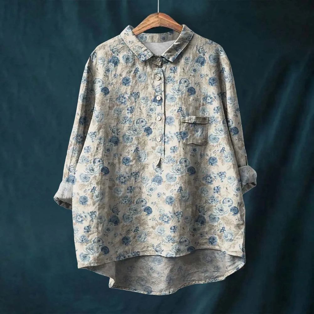 "Elegant blomsterskjorte med stribet design og bløde farvetoner, perfekt til både formelle og afslappede outfits."