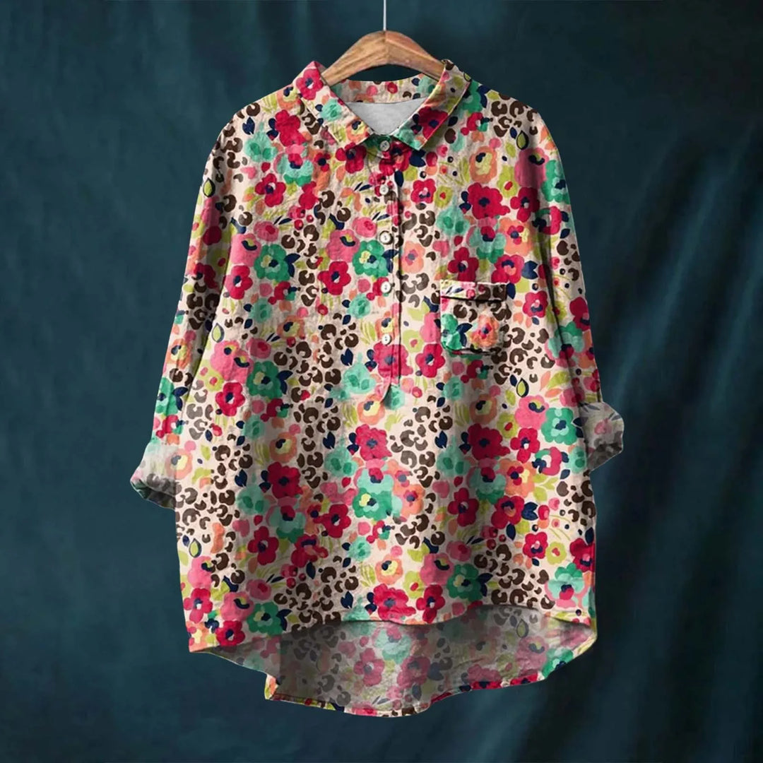 "Elegant blomsterskjorte med stribet design og bløde farvetoner, perfekt til både formelle og afslappede outfits."