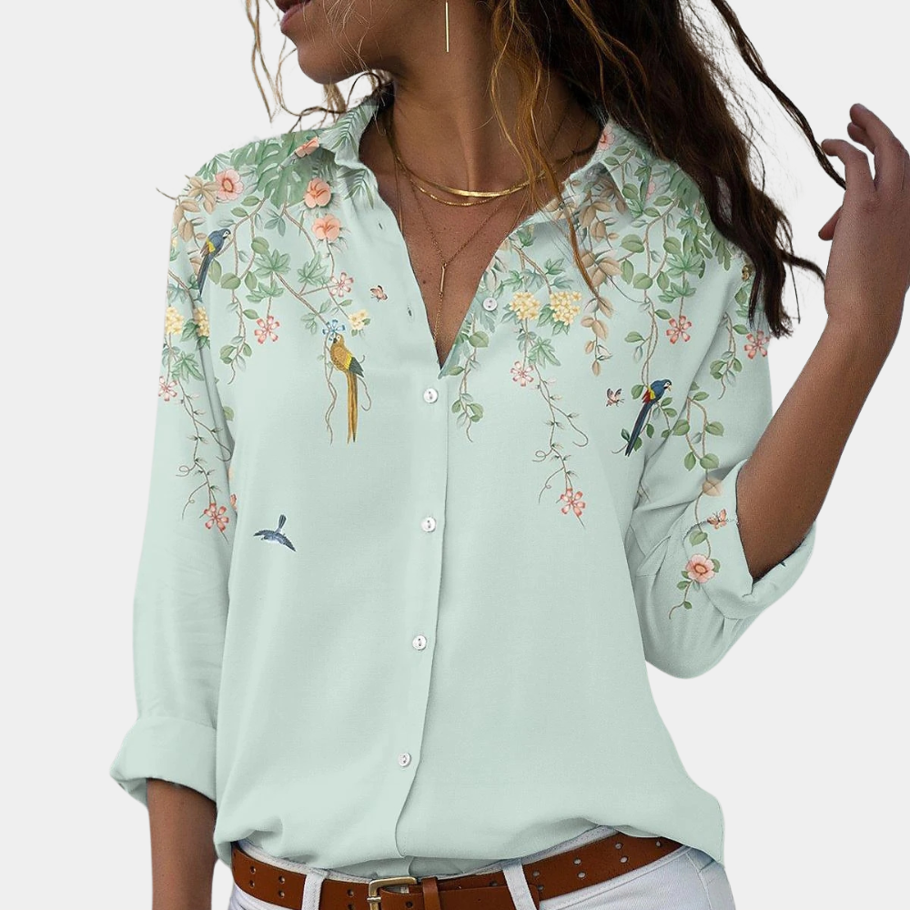 Elegant blomstret bluse til kvinder i grønne nuancer, ideel til sommerbrug og både formelle samt afslappede anledninger.