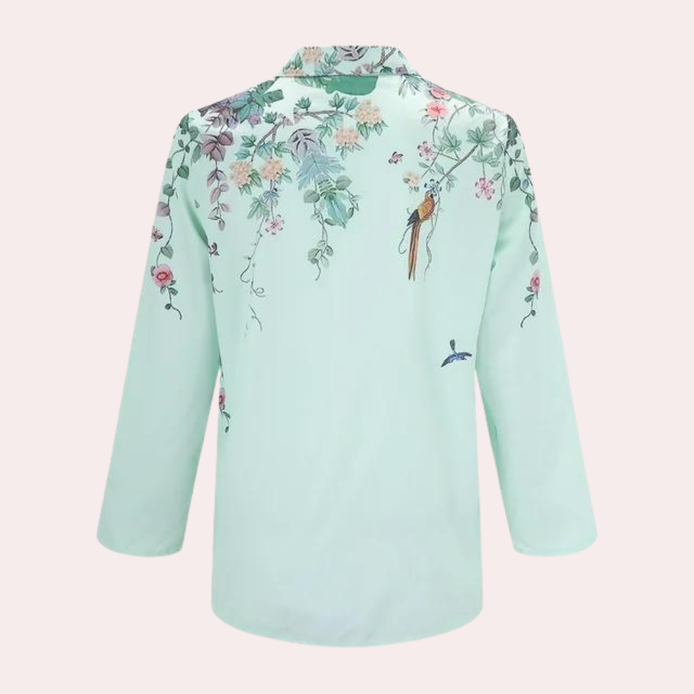 Elegant blomstret bluse til kvinder i grønne nuancer, ideel til sommerbrug og både formelle samt afslappede anledninger.