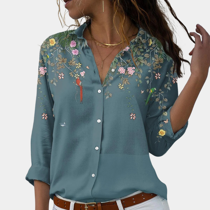 Elegant blomstret bluse til kvinder i grønne nuancer, ideel til sommerbrug og både formelle samt afslappede anledninger.