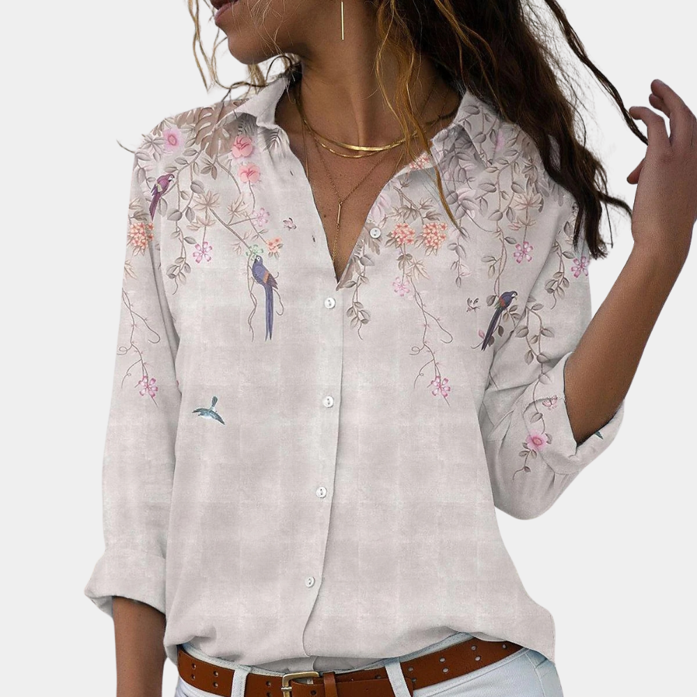 Elegant blomstret bluse til kvinder i grønne nuancer, ideel til sommerbrug og både formelle samt afslappede anledninger.