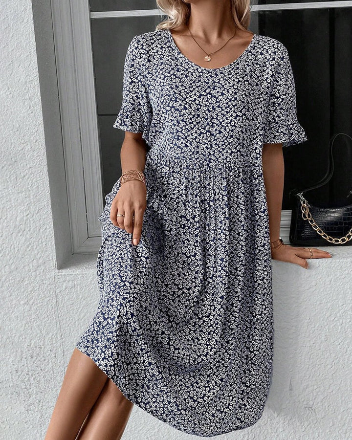 "Elegant blomstret midi-kjole med flæseærmer til kvinder i flere farver, ideel til både fest og hverdag."