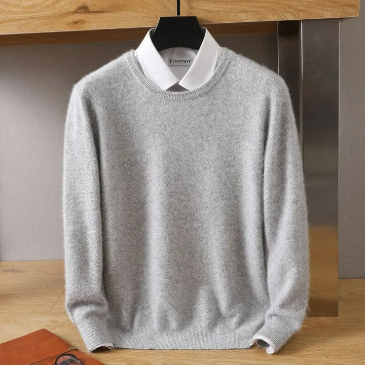 "Elegant cashmere-sweater i beige og turkis, fremhæver blødhed og nordisk stil, perfekt til hverdag og fest."