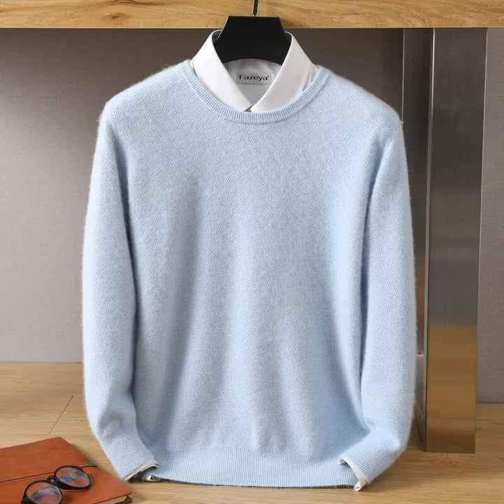 "Elegant cashmere-sweater i beige og turkis, fremhæver blødhed og nordisk stil, perfekt til hverdag og fest."