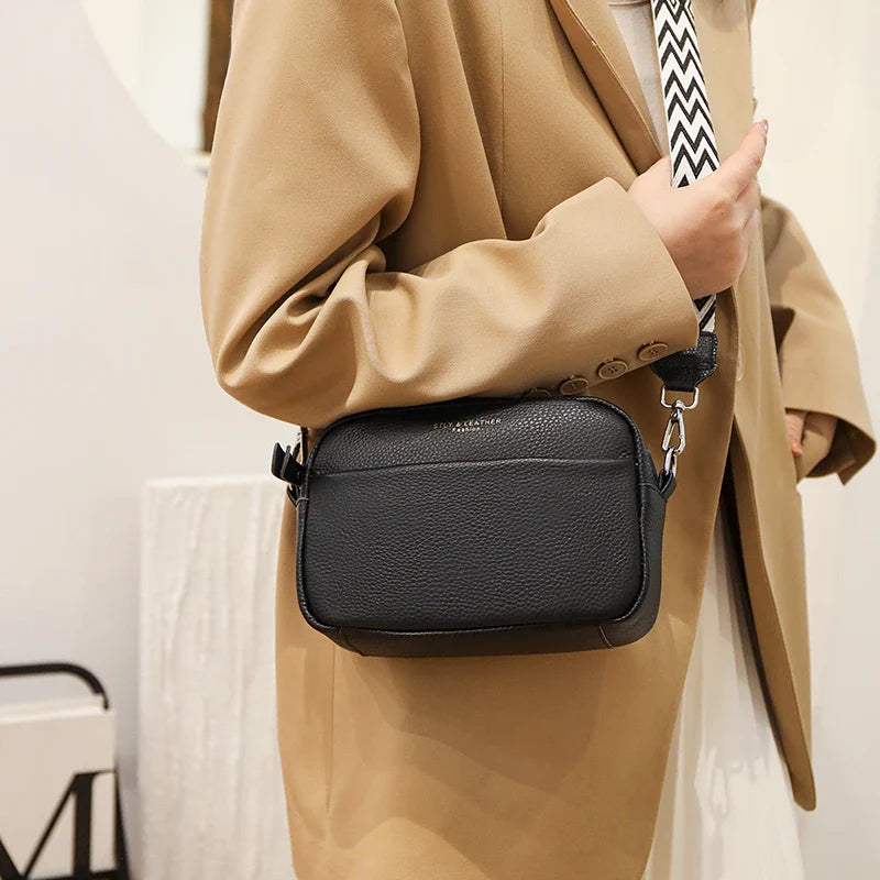 "Elegant crossbody-taske i ægte læder til kvinder; alsidigt design med justerbar rem og flere rum; passer til enhver stil."