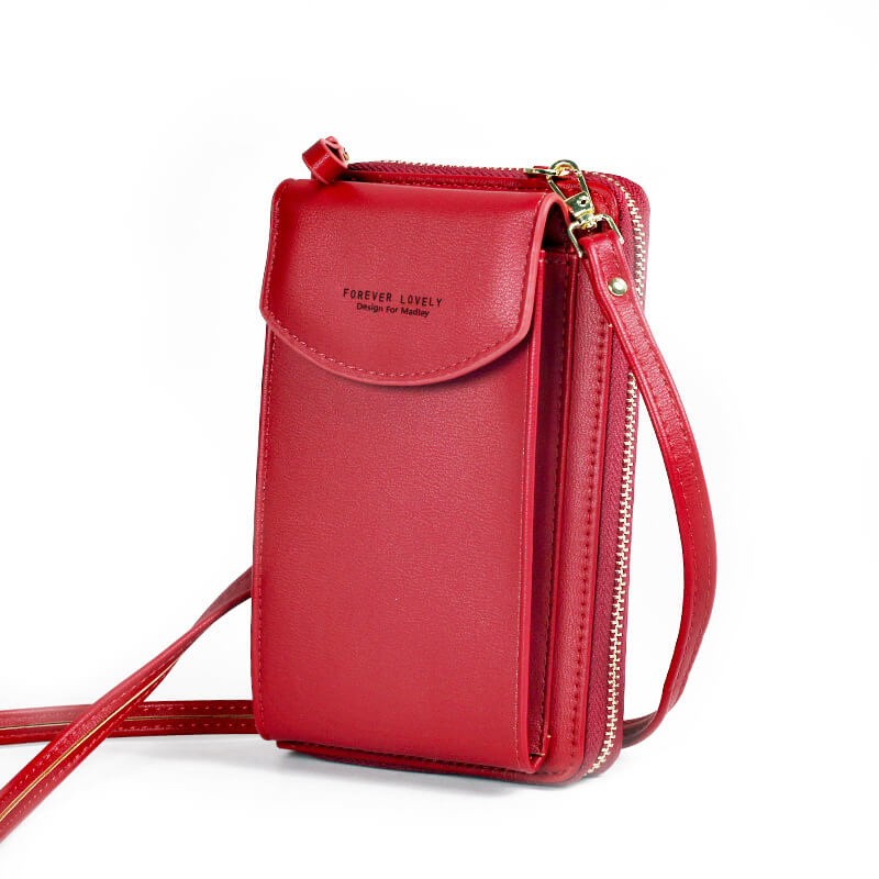 Elegant crossbody taske med guldfarvede beslag og justerbar rem, ideel til hverdagsbrug og festlige lejligheder.