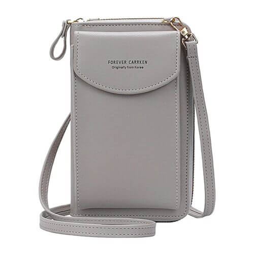 Elegant crossbody taske med guldfarvede beslag og justerbar rem, ideel til hverdagsbrug og festlige lejligheder.